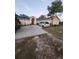 House exterior with driveway and a minivan parked at 4635 Deer Run Rd, St Cloud, FL 34772