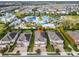 An aerial view of a home near a water park, a putt-putt course, and other resort-style community amenities at 220 Clawson Way, Kissimmee, FL 34747