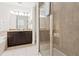 Bathroom featuring a double vanity, glass shower, and a soaking tub at 220 Clawson Way, Kissimmee, FL 34747