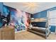 Bedroom featuring Star Wars themed wall art and bunk beds at 220 Clawson Way, Kissimmee, FL 34747
