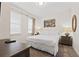 Cozy bedroom with a queen bed, soft carpet, and a serene ambiance for relaxation at 220 Clawson Way, Kissimmee, FL 34747