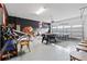 Finished game room with arcade games, foosball, ping pong, and an epoxied floor at 220 Clawson Way, Kissimmee, FL 34747