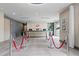 Elegant lobby with concierge desk, modern decor, and subtle lighting, enhanced by decorative ropes at 220 Clawson Way, Kissimmee, FL 34747