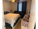 Bedroom with double bed and couch at 1031 S Hiawassee Rd # 2524, Orlando, FL 32835