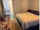 King-size bed in a spacious bedroom at 1031 S Hiawassee Rd # 2524, Orlando, FL 32835