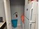 Small laundry closet with shelving and fire extinguisher at 1031 S Hiawassee Rd # 2524, Orlando, FL 32835