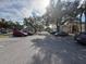 Condo complex parking lot with various cars parked at 1031 S Hiawassee Rd # 2524, Orlando, FL 32835