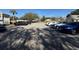 Ample parking lot with cars parked and tree shadows at 1049 S Hiawassee Rd # 3412, Orlando, FL 32835