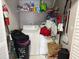 A messy laundry closet with washer and dryer at 1065 S Hiawassee Rd # 1416, Orlando, FL 32835