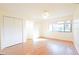 Bright bedroom with wood floors and large window at 255 Crown Oaks Way, Longwood, FL 32779