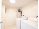 Laundry room with washer, dryer, and water heater at 255 Crown Oaks Way, Longwood, FL 32779