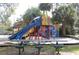 playground with slides and picnic tables at 255 Crown Oaks Way, Longwood, FL 32779