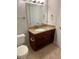 Clean bathroom with granite vanity and updated fixtures at 5124 Conroy Rd # 27, Orlando, FL 32811