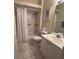 Clean bathroom with shower/tub combo, toilet and vanity at 305 Pinecrest Rd, Mount Dora, FL 32757