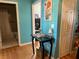 Clean bathroom with light teal walls and a shower at 305 Pinecrest Rd, Mount Dora, FL 32757