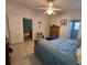 Bedroom with wooden dresser and ceiling fan at 305 Pinecrest Rd, Mount Dora, FL 32757