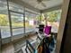 Relaxing screened porch overlooking backyard at 305 Pinecrest Rd, Mount Dora, FL 32757