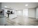 Bright kitchen featuring white cabinets and a kitchen island at 3045 Dove Ln, Mulberry, FL 33860