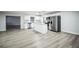 Bright kitchen featuring white cabinets and a kitchen island at 3045 Dove Ln, Mulberry, FL 33860
