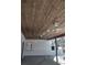 Covered patio area with wood ceiling and pool view at 3045 Dove Ln, Mulberry, FL 33860