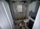 Bathroom with damaged flooring and shower at 216 N Salem St, Eustis, FL 32726