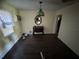 Dining room with dark hardwood floors and a mirror at 216 N Salem St, Eustis, FL 32726