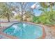 Backyard swimming pool for relaxing and enjoying the outdoors at 4539 Wild Rose Ct, Orlando, FL 32808