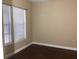 Condo bedroom with hardwood floors and neutral color walls at 705 Celebration Ave # 705, Celebration, FL 34747