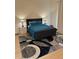Cozy bedroom features a stylish bed with a plush comforter and a contemporary area rug at 9805 Sw 44Th Ter, Ocala, FL 34476