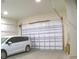 Spacious garage with automatic door opener, easily fits two cars at 9805 Sw 44Th Ter, Ocala, FL 34476