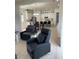 Open-concept living area showcases modern decor, light floors, and a seamless flow to the kitchen at 9805 Sw 44Th Ter, Ocala, FL 34476