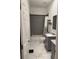 Clean bathroom with a shower/tub combo, gray vanity, and marble floor at 1150 Sweet Heather Ln, Apopka, FL 32712