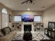 Living room features a fireplace and built-in shelving at 1150 Sweet Heather Ln, Apopka, FL 32712