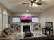 Living room features a fireplace and built-in shelving at 1150 Sweet Heather Ln, Apopka, FL 32712