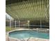 Enjoy this refreshing pool with a retractable awning for shade at 1150 Sweet Heather Ln, Apopka, FL 32712