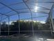 Screened pool enclosure offering sun-drenched relaxation at 1150 Sweet Heather Ln, Apopka, FL 32712