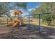 A community playground with slides and swings at 301 New Providence Promenade, Davenport, FL 33897