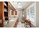 Bathroom featuring a large vanity, a walk-in shower with glass doors, and lots of natural light at 4503 Se 14Th St, Ocala, FL 34471