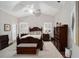 Spacious main bedroom with a vaulted ceiling, ceiling fan, and hardwood floors at 4503 Se 14Th St, Ocala, FL 34471