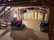 Unfinished attic with storage space and insulation at 889 Brantley Dr, Longwood, FL 32779