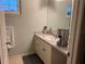 Clean bathroom with vanity, large mirror, and coffee maker at 889 Brantley Dr, Longwood, FL 32779