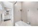 Bathroom featuring a tub and shower combo with decorative tile work and a white vanity at 889 Brantley Dr, Longwood, FL 32779