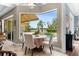 Dining Area with a bay window overlooking the pool and backyard at 889 Brantley Dr, Longwood, FL 32779