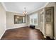 Dining room with hardwood floors, natural light, and ornate antique armoire at 889 Brantley Dr, Longwood, FL 32779