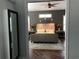 View of main bedroom from doorway, showcasing hardwood floors and stylish decor at 889 Brantley Dr, Longwood, FL 32779