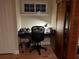 Home office space with a desk and chair, near a sauna at 889 Brantley Dr, Longwood, FL 32779