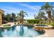 Stunning pool and spa with lush landscaping, perfect for relaxing and entertaining at 889 Brantley Dr, Longwood, FL 32779