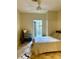 Bedroom with access to balcony and ceiling fan at 860 N Orange Ave # 258, Orlando, FL 32801