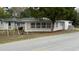 Newly renovated home with a spacious yard and charming curb appeal at 11331 Northern Ave, Leesburg, FL 34788