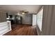 Bright living room with hardwood floors and ceiling fan at 11331 Northern Ave, Leesburg, FL 34788